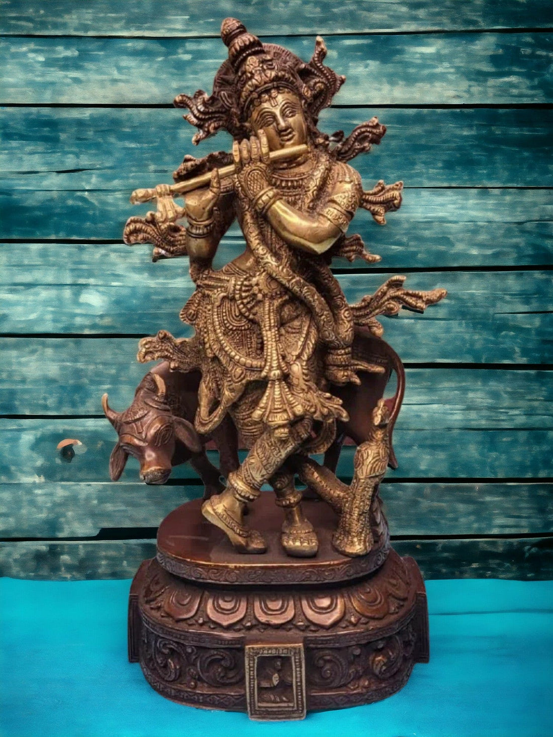 Brass krishna with peacock