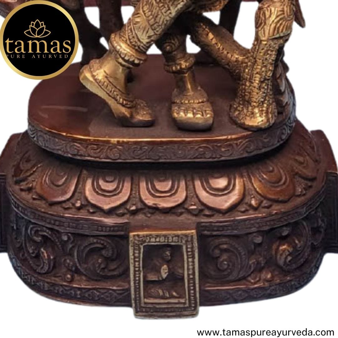 Brass krishna with peacock