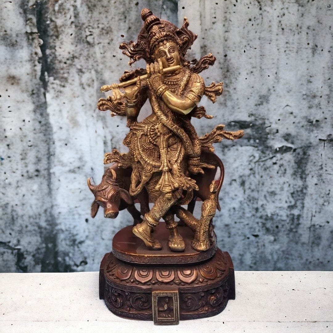 Brass krishna with peacock