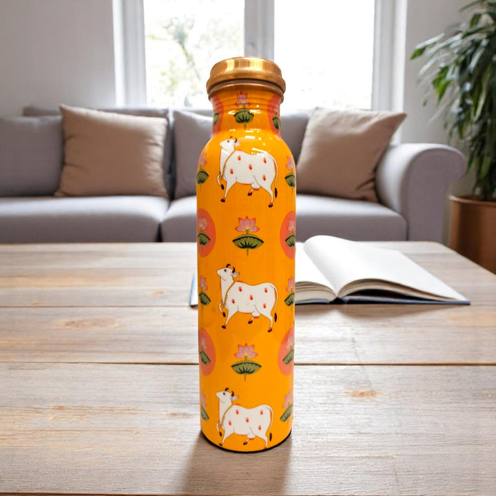Tamas – Pichwai Harmony: Small Cow in Yellow (Copper water Bottle) – Handcrafted, Leak-Proof, 1000 ML (10.5 inch)